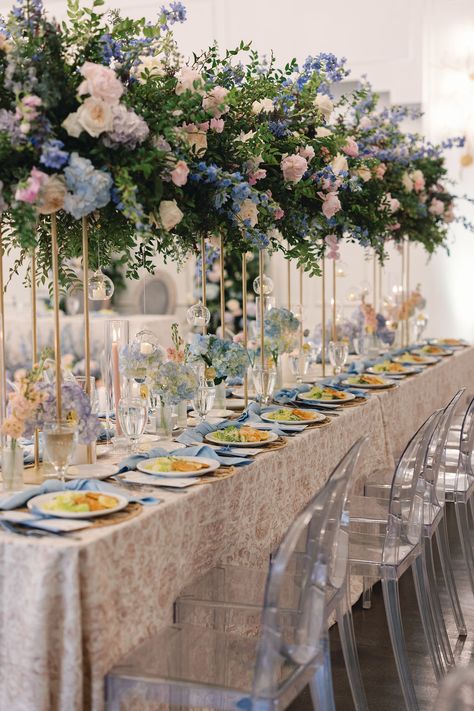 Every corner, a cascade of blooms; every moment, wrapped in petal-perfumed air. Planning & Coordination: @houston_soiree Photography: @brandypalaciosphoto Videography @epweddingfilms Florals: @caliandbloom Linens & Decor: @decorbydulce Catering: @churrascoscatering Beverages: @bar.1901 Cake & Desserts: @danmaries.creations DJ & Entertainment: @elevatedavproduction Photo Booth: @htxphotobooth HMU: @pinkpaletteartists Dance Floor: @2botcreation Boba: @gongchaaa_htown Special Effects: @roarove... Bud Vases And Candles, Pastel Floral Arrangements, Orchard Photography, Live Painter, Peach Orchard, Glass Bud Vases, Small Centerpieces, Tall Centerpieces, Fairy Wedding