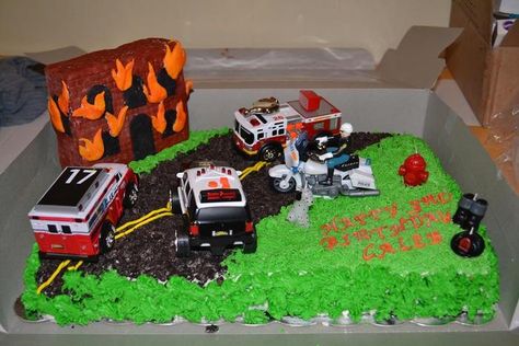 Sort of blended firetrucks and police cars for the whole party (police tape and flames for decor) and then all the vehicles on the cake. Rescue Vehicles Birthday Party Cake Emergency Vehicle Birthday Cake, Vehicles Birthday Party, Police Tape, Fireman Party, Fireman Birthday, Firefighter Birthday, Hot Dog Stand, Truck Birthday, Firetruck Birthday