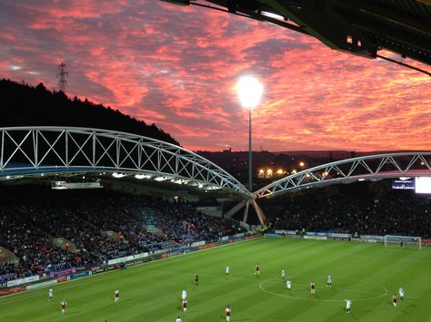 Under blood red skies at Huddersfield Town football stadium Huddersfield Town Football, English Football Stadiums, Red Skies, Huddersfield Town, Old Football, Football Stadium, English Football, Football Stadiums, Red Sky