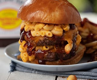 Sweet Baby Ray’s | BBQ Mac and Cheese Burger Mac And Cheese Hamburger, Sweet Baby Rays Recipes, Bbq Mac And Cheese, Sweet Baby Rays, Wing Sauces, Mac And Cheese Burger, Sweet Baby Ray, Baby Ray, Hot Sandwiches