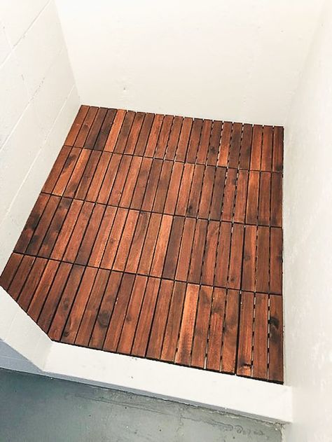 If you are looking for an inexpensive option for waterproof flooring, this post will show you how we laid a wood, waterproof flooring for the flip house shower for under $40. Diy Wood Shower Floor, Cedar Shower Floor, Brick Shower Floor, Diy Shower Floor Ideas Budget, Bamboo Shower Floor, Bamboo Shower Wall, Wooden Shower Floor, Diy Shower Floor, Wood Shower Floor