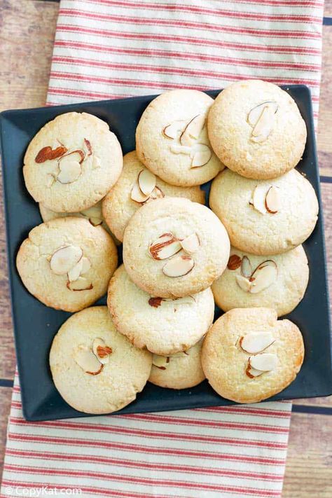 You can make the best buttery Chinese Almond Cookies that are just like the ones you enjoy at restaurants. Get the easy recipe with video and bake them for Chinese New Year or anytime you crave these tasty cookies. Perfect for shipping as gifts because they don't crumble like other cookies. #cookies #cookierecipes #giftideas #chinesefood #almondcookies #almond #dessertideas Chinese Almond Cookies, Almond Desserts, Almond Sugar Cookies, Almond Meal Cookies, Popular Cookies, Dessert Platter, Recipe Critic, Walnut Cookies, Copykat Recipes