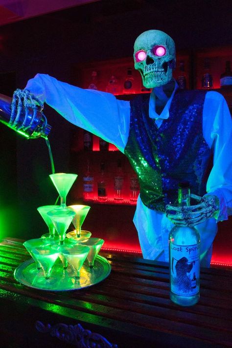 Halloween Decorations For A Bar, Skeleton Halloween Decorations Indoor, Horror Themed Restaurant, Halloween Tiki Bar, Bar Halloween Decorations, Haunted Hotel Decor, Halloween Night Club Decor, Halloween Pop Up Bar, Blacklight Halloween Party