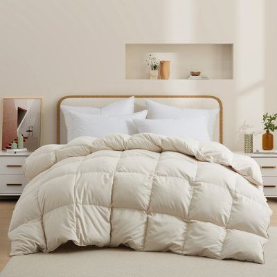 This 600-fill power all-season white down comforter is wonderful. The fluff is exactly what you are looking for. Slumber peacefully in the sublime softness of the all-season white down comforter every night. Designed with a baffle-box construction to ensure uniform distribution of the duvet filling, which helps to avoid shifting or bunching. This all-season comforter is luxuriously soft and fluffy. Four corner tabs help anchor the duvet cover to the duvet insert effortlessly. With its double-nee White Down Comforter, Feather Comforter, Down Comforters, Goose Feather, White Goose, Feather Pillows, Goose Feathers, Down Comforter, Bedding Stores