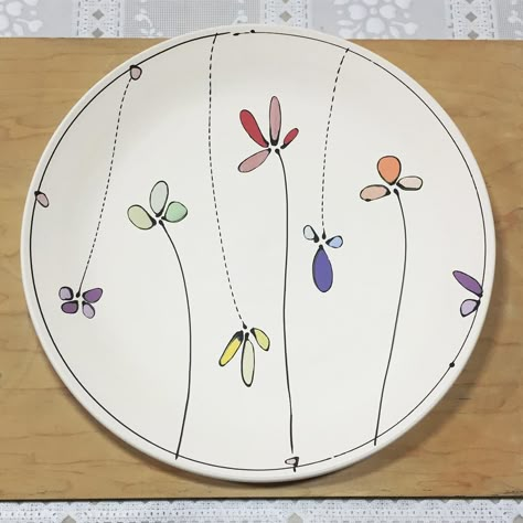 Dinner plate. Ready to be glazed. #porcelain #clay #pottery #freeceramics #flowers #color #wip Flowers Pottery Painting Ideas, Painting Pottery Plates, Ceramic Plates Art, Underglaze Painting, Ceramics Bowls Designs, Diy Pottery Painting, Pottery Painting Designs, Flowers Color, Tassen Design