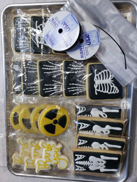 xray cookies for the end of Radiation tech week. Xray Tech Week Food, Xray Cakes Radiology, Radiography Graduation Party, X Ray Party Decorations, Mri Tech Graduation Party, X Ray Tech Week, X Ray Theme Party, Radiology Themed Party, X Ray Tech Tattoo Ideas