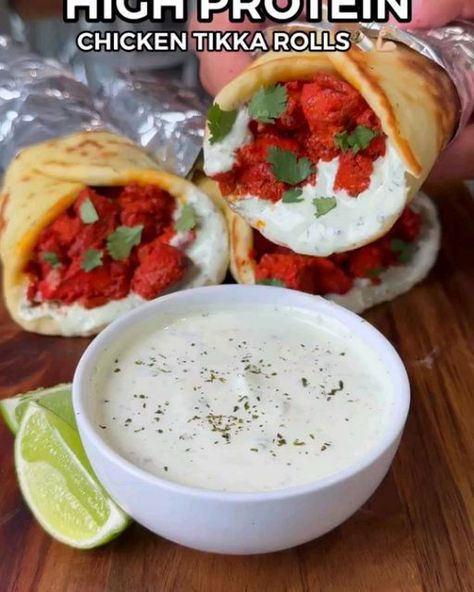 Meal Preparation on Instagram: "HIGH PROTEIN TIKKA ROLLS!🌯 by @_aussiefitness 81g Protein Each🤯💪🏼 (Per Roll - Recipe Makes 3 Rolls) 565 Calories 46gC | 4.4gF | 81gP Thank you to @ shadi_faleel for this recipe 🔥 Ingredients 👇🏼 (chicken tikka marinade) - 600g Diced Skinless Chicken Breast (raw weight) - 125g Low Fat Greek Yoghurt (Brand: YoPro Plain) - 1 Tsp Salt (NOT 1 Tbsp, typo on the video*) - 1 Tsp Turmeric - 1 Tsp Cumin Powder - 1 Tsp Coriander Powder - 1 Tsp Chilli Powder - 1 Tbsp Lemon Juice - 1 Tbsp Tomato Paste - Drop Of Red Food Colouring Yoghurt Mint Sauce 👇🏼 (blended) - 240g Low Fat Yoghurt - 15g Fresh or Dried Mint - 3 Garlic Cloves - 1 Tsp Cumin Powder - 1/2 Green Chilli - 1 Tsp Salt Garlic Flatbread 👇🏼 (recipe makes 3) - 180g Self Raising Flour (Brand: Vetta Smart Garlic Flatbread Recipe, Chicken Tikka Marinade, Low Calorie Tortilla, Clean Eating Guide, High Protein Low Calorie, Coriander Powder, Indian Snack Recipes, Chicken Tikka, Chicken Wing Recipes