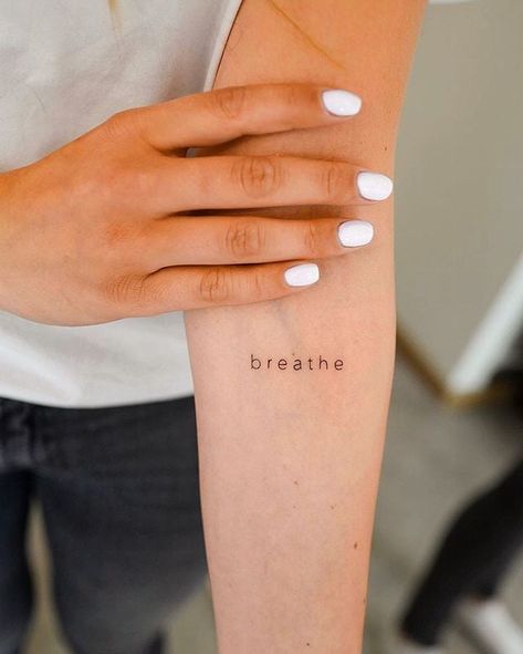 One Word Minimalist Tattoo, Breathe Arm Tattoo, Tattoos About Loving Yourself, Breathe Finger Tattoo, Breath In Breath Out Tattoo, Just One Life Tattoo, Different Not Less Tattoo, Small Tattoo Words, Word Arm Tattoo