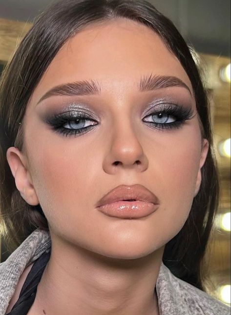 Grey Smoky Makeup, Silver Makeup Blue Eyes, Black Smokey Eye With Silver Glitter, Silver Eyeshadow Brown Eyes, Dark Smokey Eye Makeup Blue Eyes, Grey Eyes Makeup Look, Black Silver Smokey Eye, Blue Grey Eyes Makeup, Grey Outfit Makeup Looks