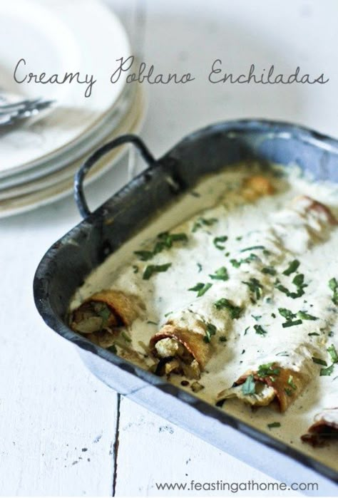 Roasted Poblano Enchiladas with Chicken or Cauliflower - with a delicious velvety poblano cream sauce. Serve with fresh cilantro and lime. | www.feastingathome.com Poblano Enchiladas, Feasting At Home, Roasted Poblano Peppers, Roasted Poblano, White Chicken Enchiladas, Creamy Chicken Enchiladas, Recipes Authentic, Poblano Peppers, Stuffed Poblano Peppers