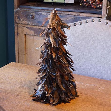 Small Natural Schlappen Feather Tree 18" This decorative Feather Tree is made with Natural Schlappen Feathers and stands 18"" tall and approx 6-8 inches in diameter at the base. Feather Christmas Trees make great home, office or special event decorations. They also look great for Holiday window displays Masculine Christmas Tree, Deer Tail, Crow Costume, Holiday Window Display, Raven Wings, Topiary Tree, Feather Mask, Yellow Feathers, Special Events Decor