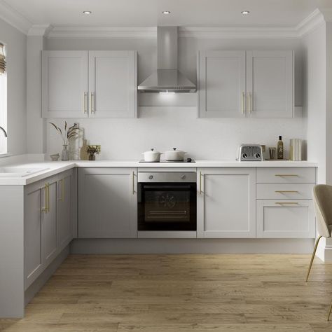 Grey Kitchen With White Worktop, Grey And White Kitchen With Gold Hardware, Light Grey Kitchen White Worktop, Kitchens With Wooden Floors, Howdens Grey Kitchen, Howdens Witney Dove Grey, Grey And Brass Kitchen, Light Grey Shaker Kitchen Ideas, Grey Kitchen Worktop Ideas