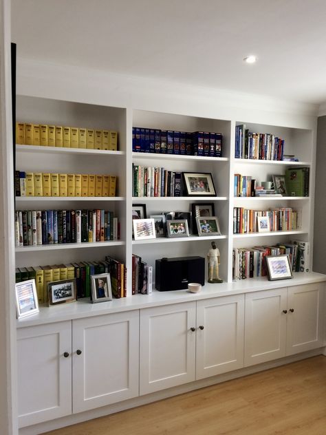 Wall to wall shelving with cupboard storage to base.  Useful shelving for books, photos and display purposes. Home Office Shelves, Office Bookshelves, Built In Shelves Living Room, Living Room Built Ins, Office Shelving, Home Library Design, Bookcase Wall, Bookshelf Design, Room Shelves