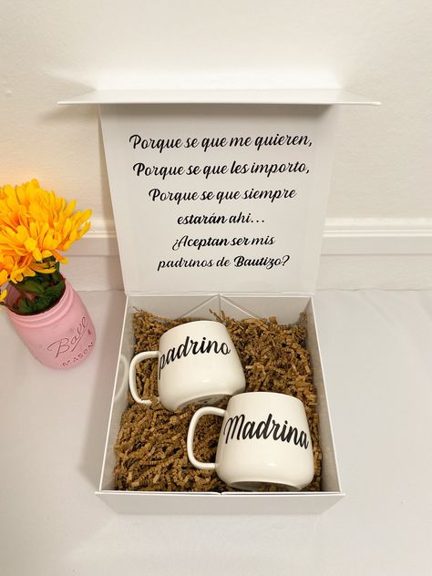 This godparent proposal box comes with 2 white ceramic mugs. Write your own personal message inside the box. padrinos propsal in spanish for bautizo, primera comunion, quincenera.  PLEASE READ INSTRUCTIONS ON HOW TO ORDER BELOW ✨DETAILS - (1) white, magnetic box - (2) 12oz white ceramic mugs - font color for mugs come in white, gold, rose gold, or black - font color for box comes in gold, rose gold, or black - add a personalized message inside  ✨HOW TO ORDER: - choose your font color for the box Padrinos Proposal Spanish Bautizo, Padrino Proposal Ideas, Padrinos Proposal Spanish, Madrina Proposal Ideas, Padrino Proposal, Godparent Proposal, Baby Boy Announcement, Godparent Gifts, Custom Cross