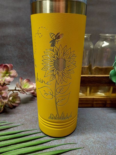 Engraved Little Sunshine Sunflower Themed Tumbler, Personalized Stainless Steel Tumbler. Double walled Engraved Polar Camel 22oz Tumbler. Keeps cold drinks cold, hot drinks hot for hours and is Dishwasher safe.  This is an Engraved Tumbler so there is no vinyl to peel off and will still be dishwasher safe after engraving. If you would like a name on the tumbler, Just enter it in the personalization box. Note that the Name you enter in the personalized section will be copied and pasted so please make sure that there are no mistakes. If you would like a different style, brand of tumbler message me for options and prices. Bumble Bee Tumbler Ideas, Honey Bee Tumbler, Bumble Bee Tumbler, Engraved Yeti Tumbler, Sunflower And Bee Tumbler Cup, Sunflower And Butterfly Tumbler Cup, Engraved Yeti, Yeti Tumbler, Engraved Tumbler