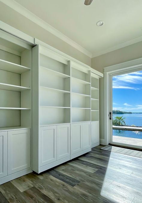 Coastal Murphy Bed Ideas, Murphy Bed With Storage Built Ins, Murphy Bed In Loft, Murphy Bed Hidden Bookcase, Murphy Bed Aesthetic, Murphy Queen Bed, Diy Murphy Bed With Bookshelves, Murphy Bed With Shelves Built Ins, Murphy Bed In Playroom