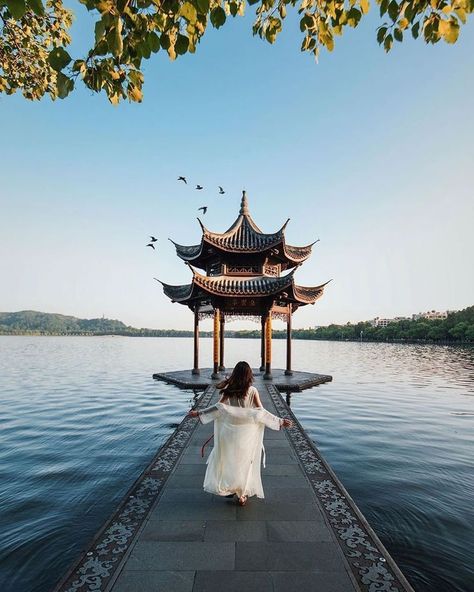 Hangzhou, China on Instagram: “Running towards the magnificent West Lake and embracing the tranquility has always been a marvellous way to start a day. 💭 📷 by @w.n__t…” Chinese Places, Hangzhou China, Flatiron Building, China Travel, Editing Tools, West Lake, Hangzhou, Pretty Places, Asia Travel