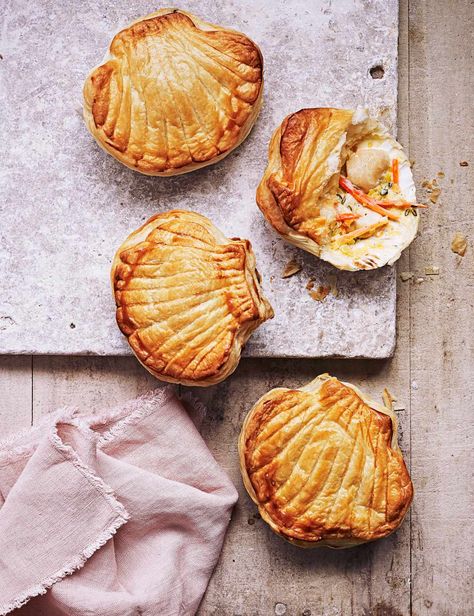 We serve these pretty pies in their original scallop shell and top with flaky puff pastry, a perfect way to impress guests Scallop Pie Recipe, Mermaid Picnic, Best Scallop Recipe, Easy Scallop Recipes, Fresh Scallops, Coquille St Jacques, Easy Starters, Creamed Leeks, Fish Pie