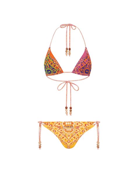 Triangle halter neck top Beaded Removable cups Placement print + hand beaded Tie back 90's style tie side pant Matte lycra Curved fixed waist Cheeky bottom coverage Bead details on ties Triangl Bikinis, Triangl Swim, Beaded Tie, Swimsuit Inspo, Side Pants, Placement Print, Cute Bathing Suits, The Triangle, Swim Swim