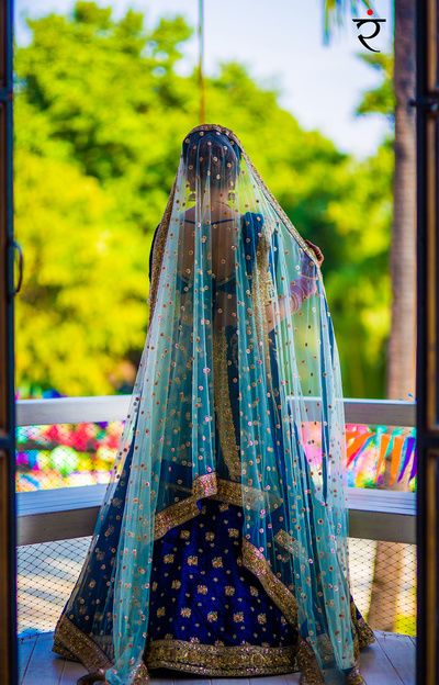 Sangeet Lehengas - Indigo Blue Lehenga with Aqua Net Dupatta with Pink Detailing | WedMeGood #wedmegood #indianbride #indianwedding #blue #lehenga #bridal Blue Colour Combinations, Dark Blue Lehenga, Lehenga Blue, Bridal Dupatta, Blue Lehenga, Indian Wedding Planning, Desi Wedding, Bridal Photography, Indian Wedding Dress