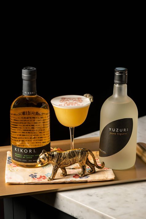 Celebrate Lunar New Year with a Spicy Yuzu Passionfruit Sour Refreshing Cocktail, Japanese Whisky, Red Chili Peppers, Korean Dishes, Honey Syrup, Japanese Rice, Angostura Bitters, Year Of The Tiger, Refreshing Cocktails