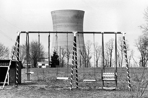 Equipment malfunction and human error lead to a partial reactor meltdown at the Three Mile Island nuclear power plant near Middletown, Pennsylvania. Description from archive.wired.com. I searched for this on bing.com/images District 3 Aesthetic, Hunger Games District 13, Hunger Games Districts, District 13, Island Photos, Nuclear Power Station, Susquehanna River, Too Close For Comfort, Nuclear Plant