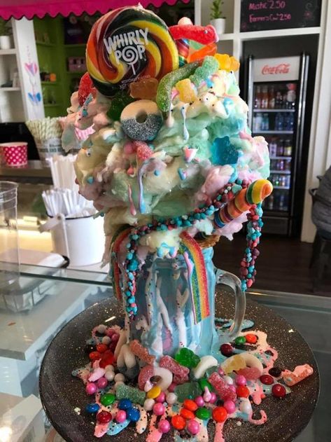 This is the most insane freak shake we've ever seen! Crazy Shakes, Unicorn Desserts, Everything But The Kitchen Sink, Candy Drinks, Ice Cream Candy, Rainbow Food, Milkshake Recipes, Unicorn Foods, Milk Shakes