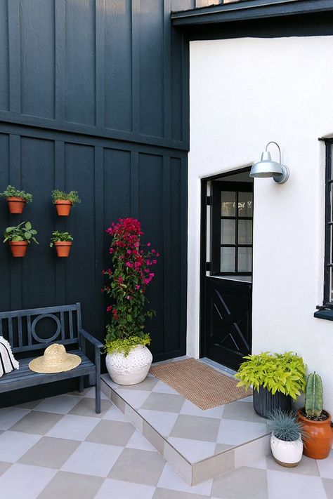 Looking for exterior back door ideas? Well, you've come to the right place. We've covered it all, from discreet backyard entrances to openings that take up an entire wall. Here's our handy guide to exterior back door ideas for every space and style. #hunkerhome #backdoor #backdoorideas #exteriors #door Brown Windows, Jenny Komenda, Dutch Doors Exterior, Grilling Station, Evergreen House, Contemporary Deck, Juniper Home, Farmhouse Entry, Green Exterior