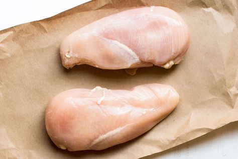 If you've cooked chicken breast or chicken tenders, chances are that you've seen a white stringy thing on the uncooked bird. What is a chicken tendon exactly, and is it safe to eat? Here, we break it down for you—and help you figure out the best way to get rid of it, too. Roasted Bone Marrow, Chicken Tenderloins, Chicken Strips, Raw Chicken, How To Make Sandwich, Sandwiches For Lunch, Cook Chicken Breast, Soft Cheese, Chicken Tenders