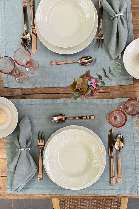 For a lunch on the terrace, choose a simple, but impactful, mise-en-place. Linen place mats, white dishes that will not weigh the style down, and vintage glasses coordinated with our Copper PVD Flat pieces of cutlery. Be guided by light-heartedness. Around the table too! #HomeDesign #IndustrialDesign #ItalianDesign #InteriorLovers #TableSetting #Cutlery #ProductionDesign #Posate #SustainableProduction #Sambonet Summer Table, Summer Tables, White Dishes, The Terrace, Vintage Glasses, Minimal Style, Place Mats, Table Set, Italian Design