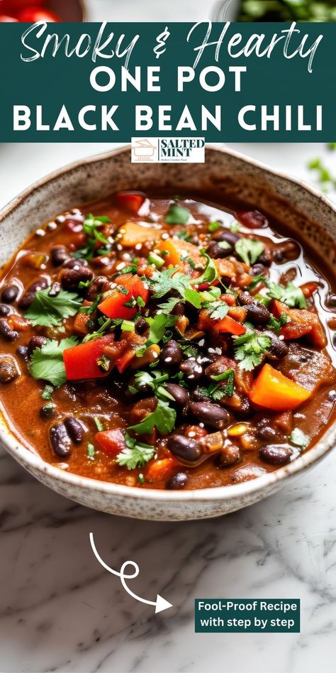 Looking for the perfect vegetarian chili? Our black bean chili is not only easy to make, whether in a crockpot or on the stove top, but it's also packed with smoky flavors that elevate it to the best chili you've ever had. Dive into a bowl of this comforting delight tonight! Green Chili Vegetarian, Vegetarian Chili Recipe Crockpot, Black Bean Chili Vegetarian, Black Bean Chilli, Black Bean Chili Recipe, Chili Vegetarian, Chili Recipe With Black Beans, The Best Chili, One Pot Vegetarian