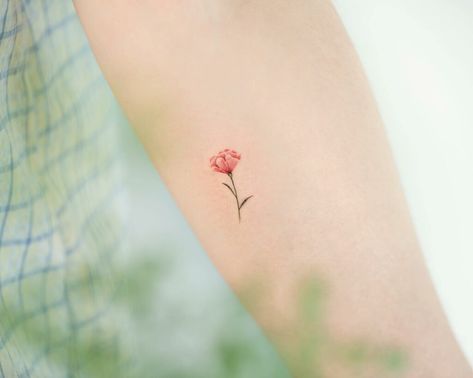 Simple Carnation Tattoo, Pink Carnation Tattoo, Carnation Flower Meaning, Tattoo Between Breast, Carnation Flower Tattoo, Carnation Tattoo, Simple Flower Tattoo, Flower Bouquet Tattoo, Purple Carnations