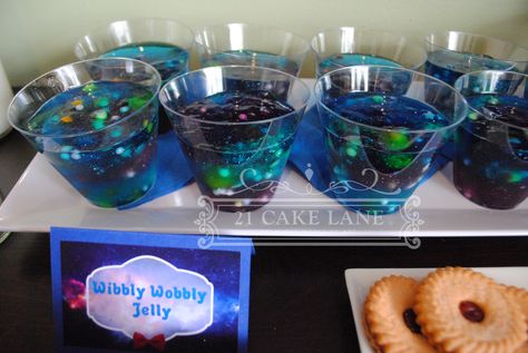 Doctor who bowling party Wibbly Wobbly Galaxy Jelly the glitter didn't show up in the photo very well :/  Instructions are here http://bakingdom.com/2012/08/doctor-who-wibbly-wobbly-timey-wimey-jello-in-a-jar.html Galaxy Jello, Doctor Who Party, Jell O Shots, 21st Cake, Aesthetic Galaxy, Party Styling, Bowling Party, Jell O, Space Party