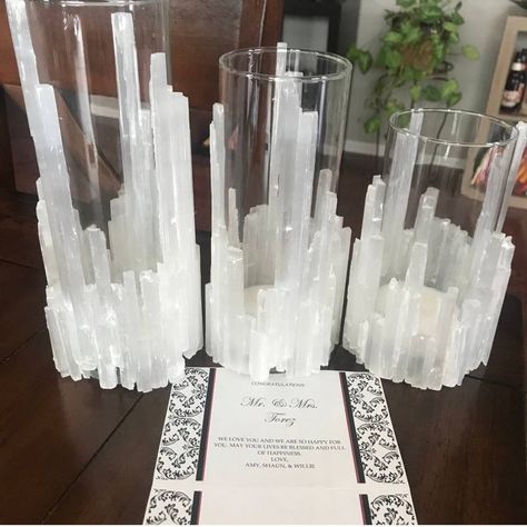 Light up your home with this beautiful natural stone Selenite Crystal candle holder 3 piece set. Candle holders can be filled with water and used with a floating candle. Comes with 3 floating candles. Set is made to order and each piece is one of a kind.  *Order entire set or buy each piece separately*  Top benefits of Selenite: Cleanses and purifies its' environment Clears negative energy Cleanses and charges other crystals Self-cleansing Its' calming properties makes it ideal for meditation and spiritual work Enhances team spirit in groups and organizations Perfect crystal for ridding the home or property of negative energy  Calms nightmares Good for memory Aids physical balance -earthcrystals.com.au Caution: Do not get the crystal Selenite wet.  Additional Candles sold separately. Three Table Crystal Zen Garden, Crystal Flower Candle, Candle Wedding Centerpieces Holders, Crystal Bowl Christmas Centerpiece Candle, Floating Candles Wedding Holders, Mountains Glass Candle, Silver Crystal Candle Holders, Crystal Collection Display Table, Crystal Pedestal Candle Holders