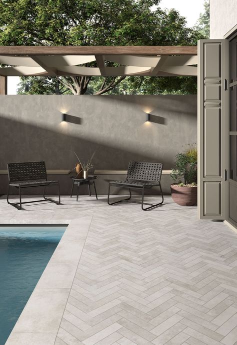 Heritage is a collection of porcelain tiles inspired by a mix of stone and concrete. The tiles have a slightly "worn" appearance, which is particularly suitable for spaces where contemporary meets an industrial mood. Ideal for outdoor application on patios, pool decks, and terraces. Outdoor Tiles Floor, Design Per Patio, Terrace Tiles, Balcony Flooring, Front Garden Landscape, Tile Stairs, Patio Tiles, Garden Oasis, Outdoor Tiles