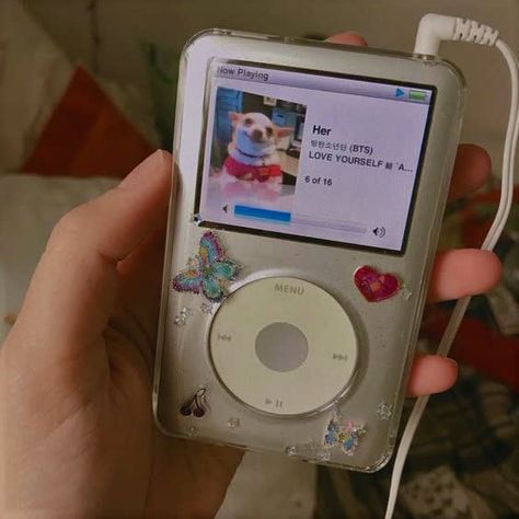 Taken from stashally user @nancy. happy i got my ipod nano 3rd generation fixed and now my music works!   really very ancient but i bought a nice casing, now it looks as good as new. i pasted some really cute stickers too hehe! Ipod Classic, Retro Gadgets, Bts Love Yourself, Retro Aesthetic, Pink Aesthetic, Mp3 Player, Cute Stuff, My Aesthetic, Ipod