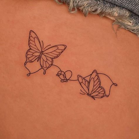 Fine line style butterfly couple tattoo located on the Butterfly Vine Tattoo Arm, Butterfly Couple Tattoo, Cute Small Tattoo Ideas, Butterfly Couple, Sister Tats, Monarch Butterfly Tattoo, Butterfly With Flowers Tattoo, Butterfly Tattoo Ideas, Small Matching Tattoos