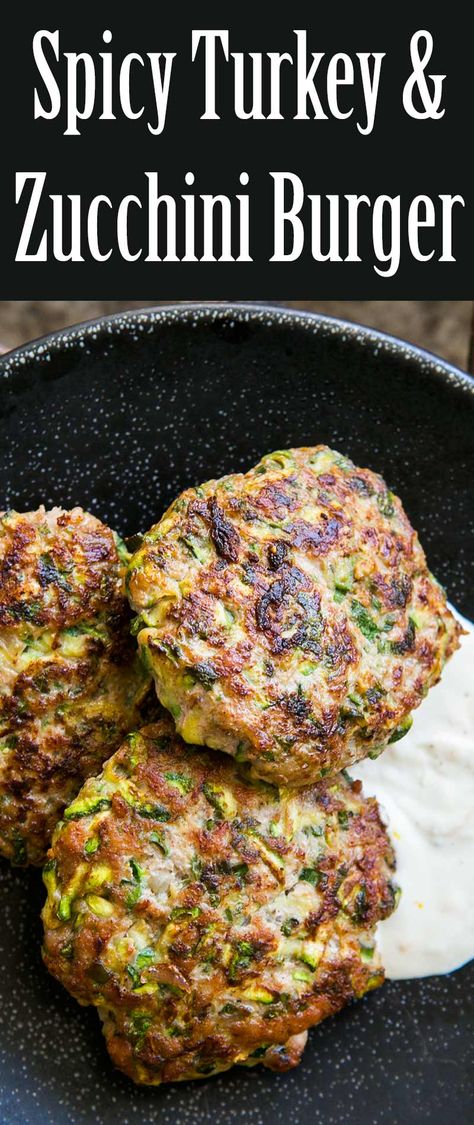 Spicy Turkey and Zucchini Burger ~ Turkey burger patties with grated zucchini, herbs, cumin, and cayenne, served with lemony sour cream sauce. ~ SimplyRecipes.com Turkey Burger Patties, Turkey And Zucchini, Zucchini Burger Recipe, Zucchini Burgers, Zucchini Burger, Spicy Turkey, Grated Zucchini, Burger Patties, Turkey Burger Recipes