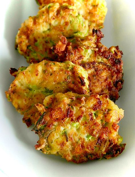 5 Delicious Greek Zucchini Recipes | Olive Tomato Greek Zucchini, Olive Tomato, Zucchini Patties, Greek Appetizers, Zucchini Chips Baked, Zucchini Feta, Leafy Salad, Roast Zucchini, Popular Appetizers