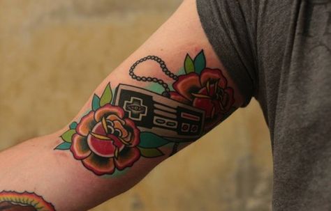 Sick NES controller tattoo! Unknown artist. Nes Tattoo, Controller Tattoo, White Lotus Tattoo, Tattoos Roses, Game Tattoo, Video Game Tattoos, Nes Controller, Ayurvedic Hair, Gaming Tattoo