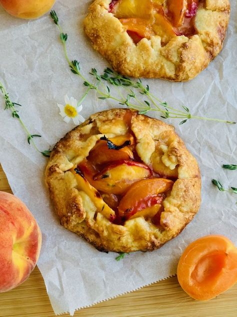 Peach, Apricot, Bourbon & Thyme Mini Galettes Apricot Galette Recipe, Peach Galette Recipe Easy, Peach Galette Recipe Puff Pastry, Mini Peach Galette, Easy Peach Galette, Peach Blackberry Galette, Peach Galette Recipe, Apricot Dessert, Apricot Slice