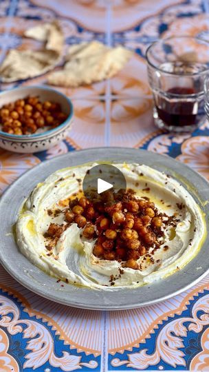 1.1M views · 60K reactions | Crispy Chickpeas with Whipped Feta - Recipe below - this is one of my fav dips ever, perfect for when you have people over this weekend. The chickpeas sink into the whipped feta - stick to the recipe below so the feta doesn’t go like soup x JGS
.
Serves 4
1 x 400g tin chickpeas, drained and dried
2 tbsp olive oil, plus extra for drizzling
2 tsp smoked paprika
2 tsp garlic powder
2 tsp dried oregano
1 tsp chilli flakes
200g feta
110g yogurt
1 clove garlic
The zest of ½ a lemon
Salt
.
 1. Pre-heat the oven to 200 fan. Chuck the chickpeas into bowl and add the olive oil. smoked paprika, garlic powder, dried oregano, chilli flakes and a good pinch of salt. Mix well and tip into a roasting tray. Roast for 20-25 minutes or until crispy but still soft inside.
2. Meanw Papadi Chat, Gregory Smith, Feta Recipe, Spiced Chickpeas, Feta Recipes, Feta Dip, Crispy Chickpeas, Whipped Feta, Lemon Salt