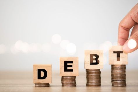 Hand putting debt wording which are prin... | Premium Photo #Freepik #photo #business #money #cartoon #world Selena Carpenter, Debt Management Plan, Debt Help, Bad Debt, Debt Reduction, Debt Settlement, Small Business Loans, Debt Relief, Debt Management