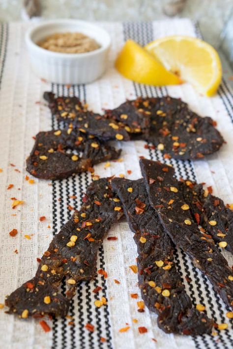 This sweet and spicy beef jerky is truly a treat. The perfect protein snack for an active day on the go! | Jerkyholic.com Spicy Beef Jerky Recipe, Spicy Beef Jerky, Beef Jerky Recipe, Best Beef Jerky, Jerky Recipe, Homemade Jerky, Making Jerky, Beef Jerky Recipes, Jerky Recipes