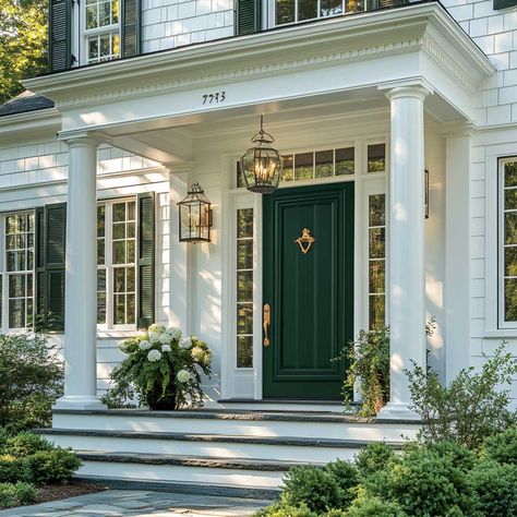 11+ Sophisticated White House Exteriors with Deep Green Accents • 333+ Inspiring Lifestyle Ideas Tan House With Green Shutters, Green Door Black Shutters, Portico Entry Ranch House, Mint Green House Exterior Color Schemes, White House With Green Door, Colored Front Door White House, Green Painted House Exterior, Green Metal Roof Houses Color Combos, White House Green Door