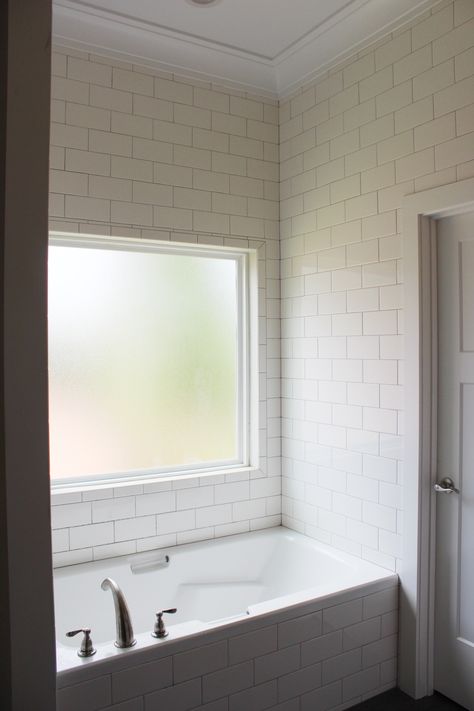 Clean finishes in the master bathroom- white subway tile, modern cove crown molding and simple doors Shower Tile To Ceiling Crown Molding, Crown Molding On Tile Wall, Crown Molding In Bathroom With Tile, Bathroom Crown Molding Ideas, Crown Molding In Bathroom, Bathroom Crown Molding, Bathroom Molding, Crown Molding Bathroom, Modern Crown Molding