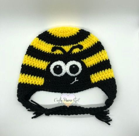 "Bumblebee character hat. Custom crocheted with acrylic yarn. Available in 6 sizes, with or without earflaps and braids.  Available in infant, toddler, child and adult sizes. Infant 0-1yrs - apx. circumference (14-16\") Toddler 1-3yrs - apx. circumference (16-17\") Child 4-10yrs - apx. Circumference (18-19\") Teen/Adult Small - apx. Circumference (19-20\") Adult Medium/Large- apx. Circumference (20-21\") Adult XL - apx. Circumference (22-23\") Have an idea for a different animal or character you Crochet Bee Hat, Bumblebee Crochet, Crochet Hat Earflap, Crochet Bumblebee, Kids Hats Patterns, Bee Hat, Crochet Character Hats, Crochet Owl Hat, Crochet Animal Hats