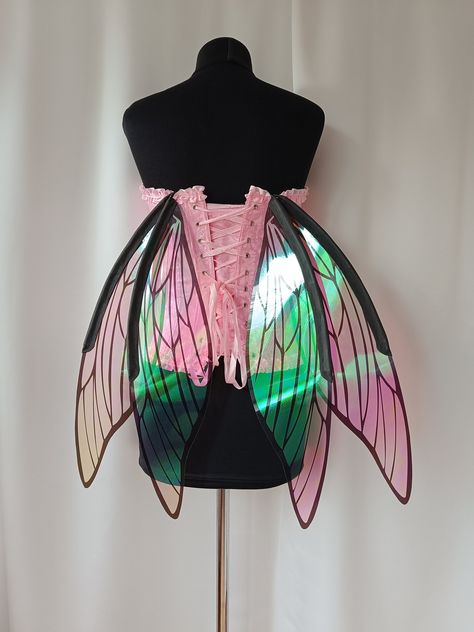 These elven  wings are transparent with black streaks. These wonderful wings are brand new. Therefore, there will be little chance that someone will come to the festival in the same costume as you. The iridescent coating of the wings changes color depending on the lighting and the color of the photo zone from pink to green. Plastic wings are attached to a flexible wire frame,it  can be placed in different positions, you can raise the wings up or down depending on what you need for the costume. Realistic Wings, Fly Costume, Meme Costume, Costume Wings, Recycled Dress, Photo Zone, Black Fairy, Costume For Halloween, Elf Costume