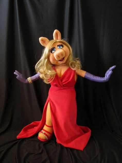 Miss Piggy was the Master of Ceremonies wearing a flaming red gown. There for the first fifteen minutes. Seems her hair was suppost to be in pigtails for the pig pin mud wrestling. She won't be back to MC...heard they sent someone to fetch Big Betty from down the road. All figured she weighed about the same. The face was full like Miss Piggy's. Heck, no one will know the difference.I don't think Betty will fit nto that red dress tho. Miss Piggy Halloween Costume, Miss Piggy Costume, Piggy Muppets, Miss Piggy Muppets, Kermit And Miss Piggy, The Muppet Show, Miss Piggy, Kermit The Frog, Jim Henson