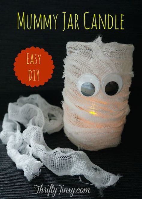 Mummy Jar Candle DIY - A Fun Halloween Craft - Thrifty Jinxy Mummy Candles, Mummy Jar, Halloween Mason Jars, Candle Jar Diy, Candle Diy, Halloween Craft Projects, Fun Halloween Crafts, Easy Halloween Decorations, Halloween Mummy